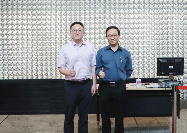 长宁张伟区长与仲利国际陈坤明总经理