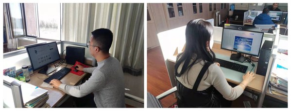 （图二：察右后旗第一中学的教师与学生收到电脑后落地使用）